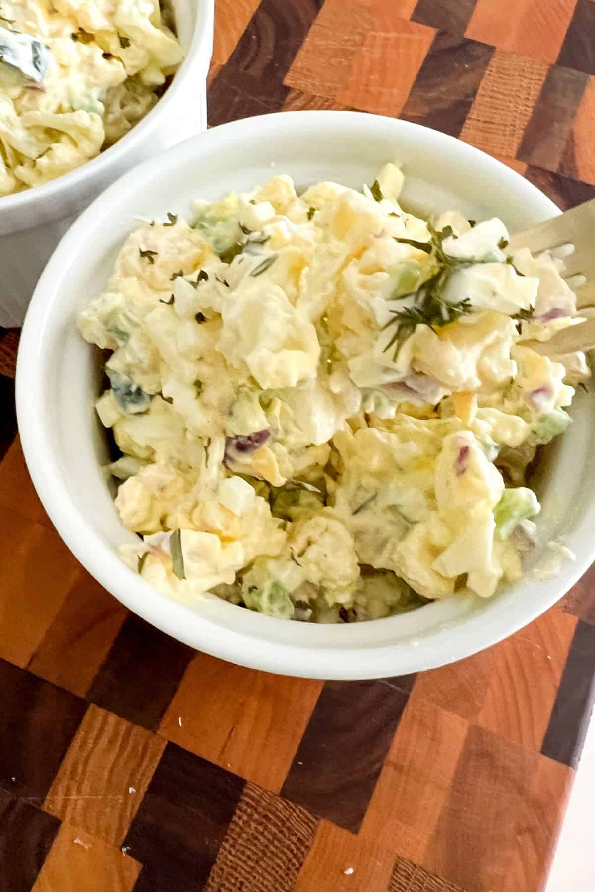 cauliflower potato salad in a bowl
